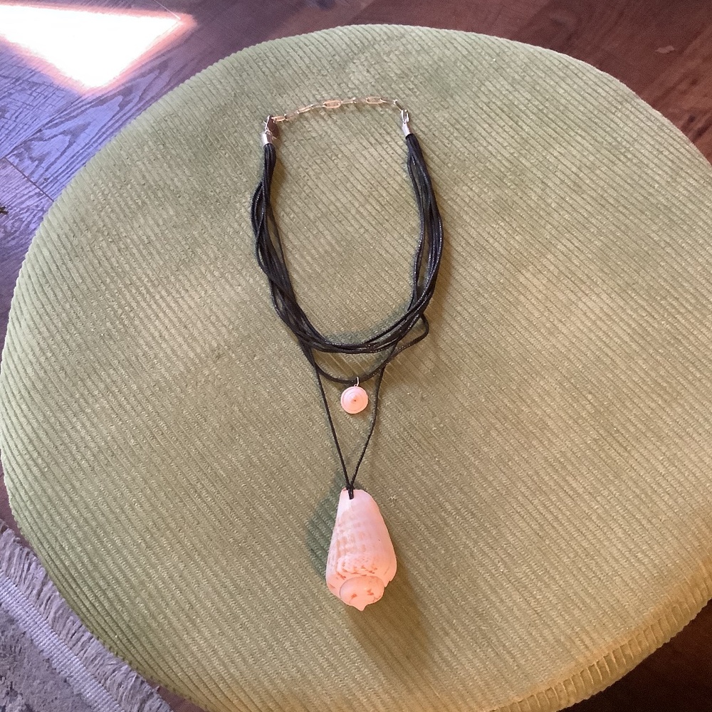 Free People shell pendant necklace on cord.